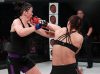 Kaitlin Young punching Sarah Patterson at Invicta FC 32 by Dave Mandel