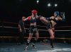 Jess Seery kicking Madelaine Duiker at Epic 15 by Emanuel Rudnicki Fight Photography