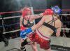 Bree Howling punching Stephanie Schmale by DL Sports Photography