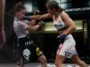 Karolina Kowalkiewicz punching Mizuki Inoue invicta 9 by Scott Hirano
