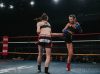 Kerrianne McKay kicking Nicola Callander at Epic 15 by Emanuel Rudnicki Fight Photography