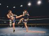 Kim Townsend at Epic 13 kicking Nong Em Tor Vittaya by Emanuel Rudnicki Fight Photography