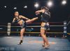 Kim Townsend at Epic 13 kicking Nong Em Tor Vittaya by Emanuel Rudnicki Fight Photography 2