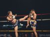 Kim Townsend at Epic 13 kicking Nong Em Tor Vittaya by Emanuel Rudnicki Fight Photography 4