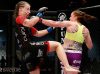 Laura Howarth spinning backfist to Alexa Conners at Invicta FC 17 by Esther Lin