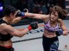 Maureen Riordon punching Shannon Sinn at Invicta 12 by Scott Hirano