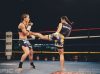 Nong Em Tor Vittaya kicking Kim Townsend at Epic 13 by Emanuel Rudnicki Fight Photography