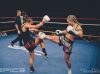 Whitney Tuna kicking Michelle Seivers at Epic 9 by Emanuel Rudnicki Fight Photography