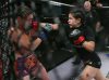 Ashley Medina punching Jillian DeCoursey at Invicta FC 25 by Scott Hirano