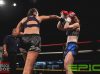 Kerrianne McKay punching Shannon Peek at Epic 17 by Brock Doe Fight Photography