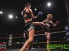 Shannon Peek kicking Kerrianne McKay at Epic 17 by Brock Doe Fight Photography