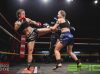 Whitney Tuna kicking Kirsty-Anne Meares at Epic 17 by Brock Doe Fight Photography