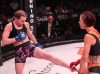 Kate Jackson kicking Colleen Schneider at Bellator 182