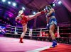 Madoka Jinnai kicking Polina Petrova at World Muay Thai Angels First Round
