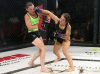 Alesha Zappitella punching Jillian DeCoursey at Invicta FC 30 by Dave Mandel