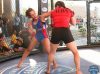 Alesha Zappitella punching Stephanie Alba at Combate Americas 13