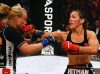 Cristiane Justino punching Jan Finney at Strikeforce June 26th 2010 by Esther Lin