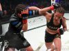 Jessica Delboni punching Ashley Cummins at Invicta FC 32 by Dave Mandel