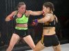 Jillian DeCoursey punching Alesha Zappitella at Invicta FC 30 by Dave Mandel