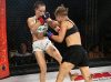Minna Grusander punching Jinh Yu Frey at Invicta FC 30 by Dave Mandel