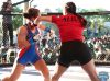 Stephanie Alba punching Alesha Zappitella at Combate Americas 13